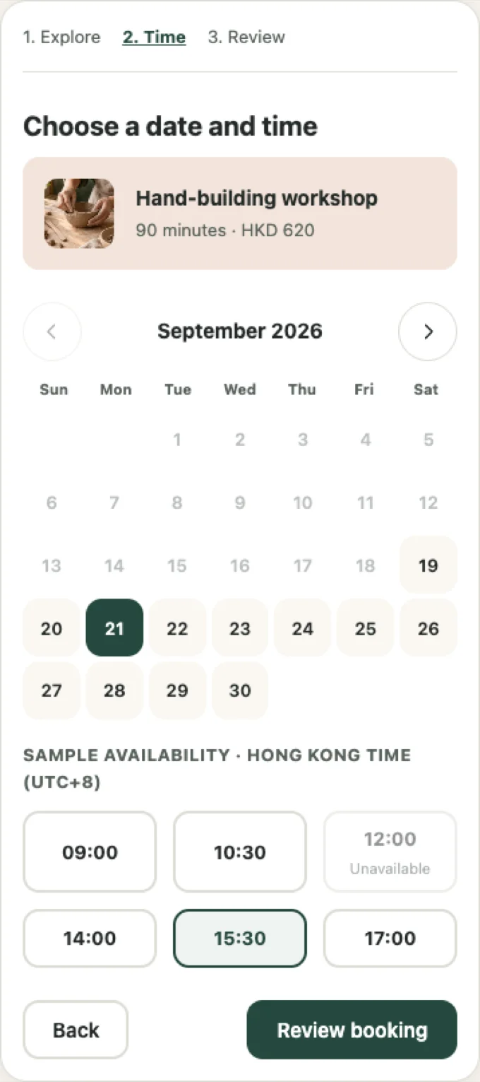 Screen showing the calendar and time selection for a Hand-building workshop booking.